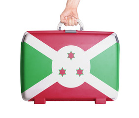 Used plastic suitcase with stains and scratches