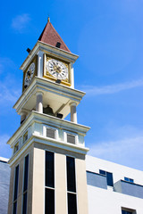 Clock tower on blue sky background