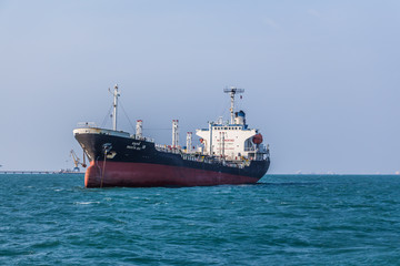 Container cargo ship at sea.