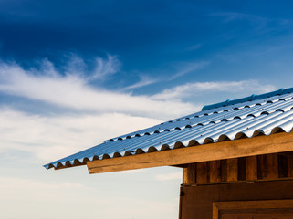 little hut and blue tile roof