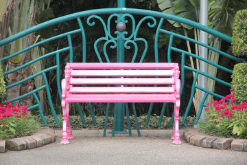 Pink chair in the park.