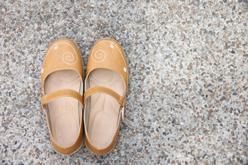 Brown leather shoes.