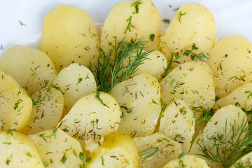 Delicious boiled potatoes with dill and olive
