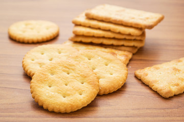Crackers on wooden background