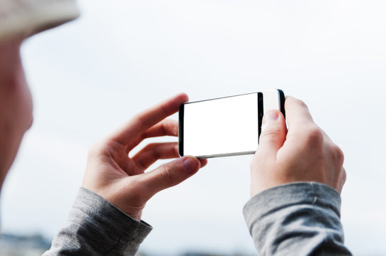 Tourist taking photo with  smart phone