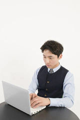 Asian businessman with laptop