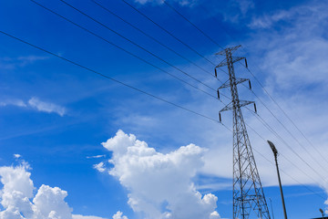 High voltage Pole against blue sky
