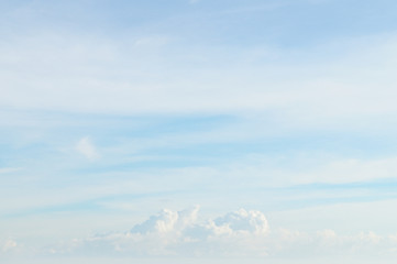 fluffy clouds in the blue sky