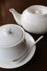 Tea pot and sugar bowl.