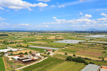 Fototapeta na wymiar aerial view of farmland and vesuvio mountain background