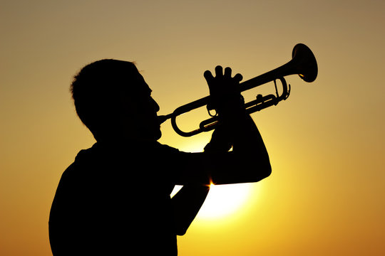 Silhouette of trumpet player