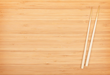Sushi chopsticks on bamboo table