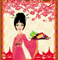 Traditional japanese pretty girl serves sushi.