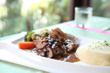 Duck confit , Roasted duck with blueberry sauce