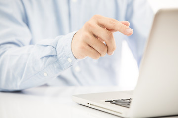 Close-up of Businessman using laptop