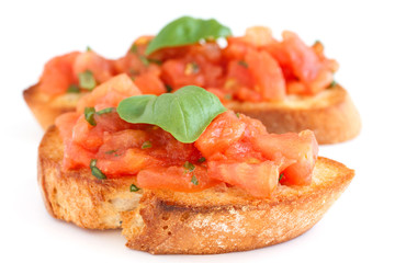 Classic italian bruschetta with tomato and basil on bread