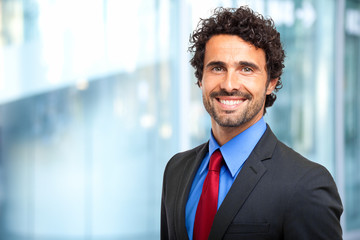 Handsome smiling businessman