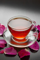 Obraz na płótnie Canvas herbal tea with rose petals