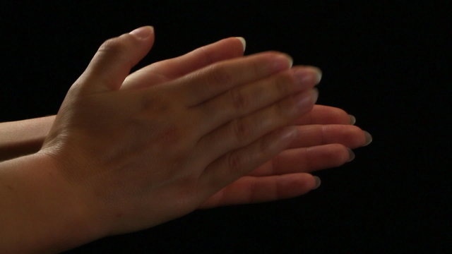 Female hands clapping in dance rhythm, close up