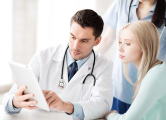 doctor and nurse with patient in hospital