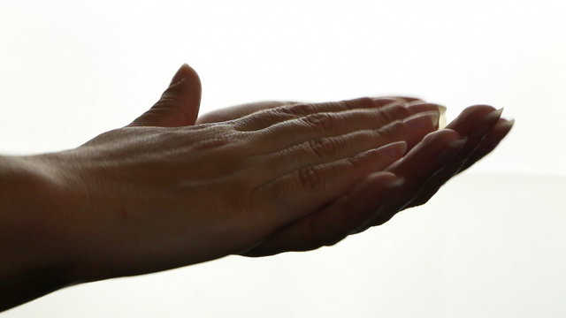 Female hands clapping in dance rhythm, close up