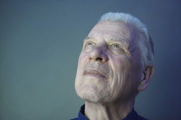 dreamily looking man