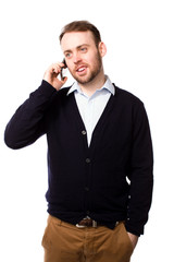 Relaxed man talking on a mobile phone