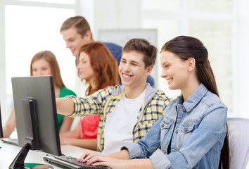 Fototapeta premium female student with classmates in computer class