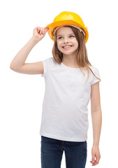 smiling little girl in protective helmet