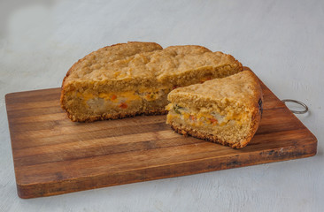 Pie oat flour and cheese filled with vegetables