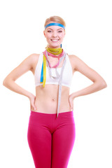 Obsessed fitness woman with a lot of colorful measure tapes