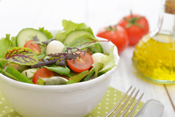 Salad with tomato and mozzarella cheese