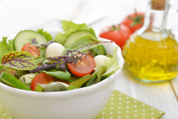 Salad with tomato and mozzarella cheese
