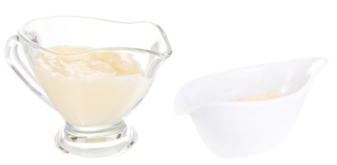 Mayonnaise in bowls isolated on white