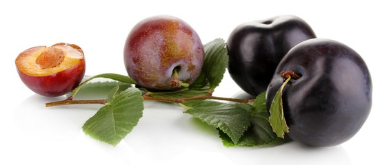 Rip plums isolated on white