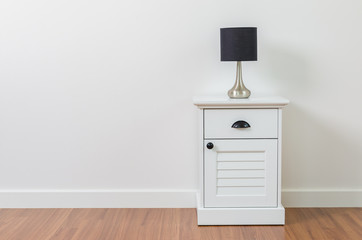 Lamp on bedside table