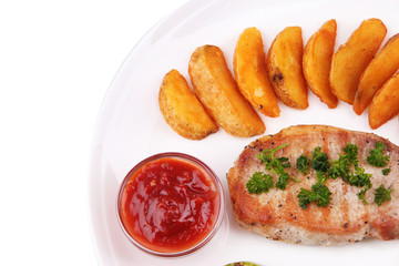 Grilled steak and grilled vegetables on plate, isolated on