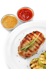 Grilled steak and grilled vegetables isolated on white