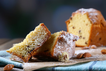 Tasty cake on table on dark background