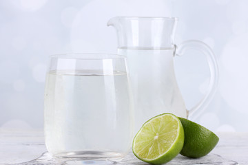 Cool water in glass, on light background