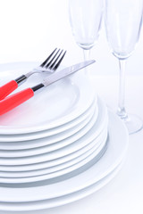 Set of white dishes isolated on white