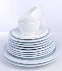 Set of white dishes isolated on white
