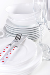 Set of white dishes close-up