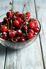 Sweet cherries on wooden table