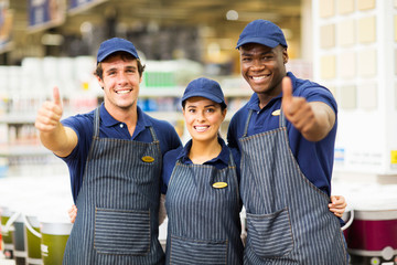 hardware store workers giving thumbs up