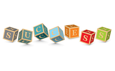 Word SUCCESS written with alphabet blocks