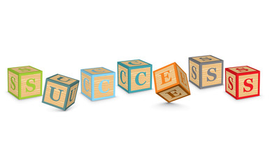 Word SUCCESS written with alphabet blocks