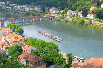 Fototapeta na wymiar city, bridge, river and barge (top view)