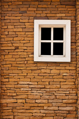White window and brick wall