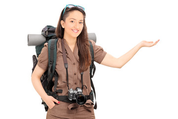 Female tourist gesturing with hand